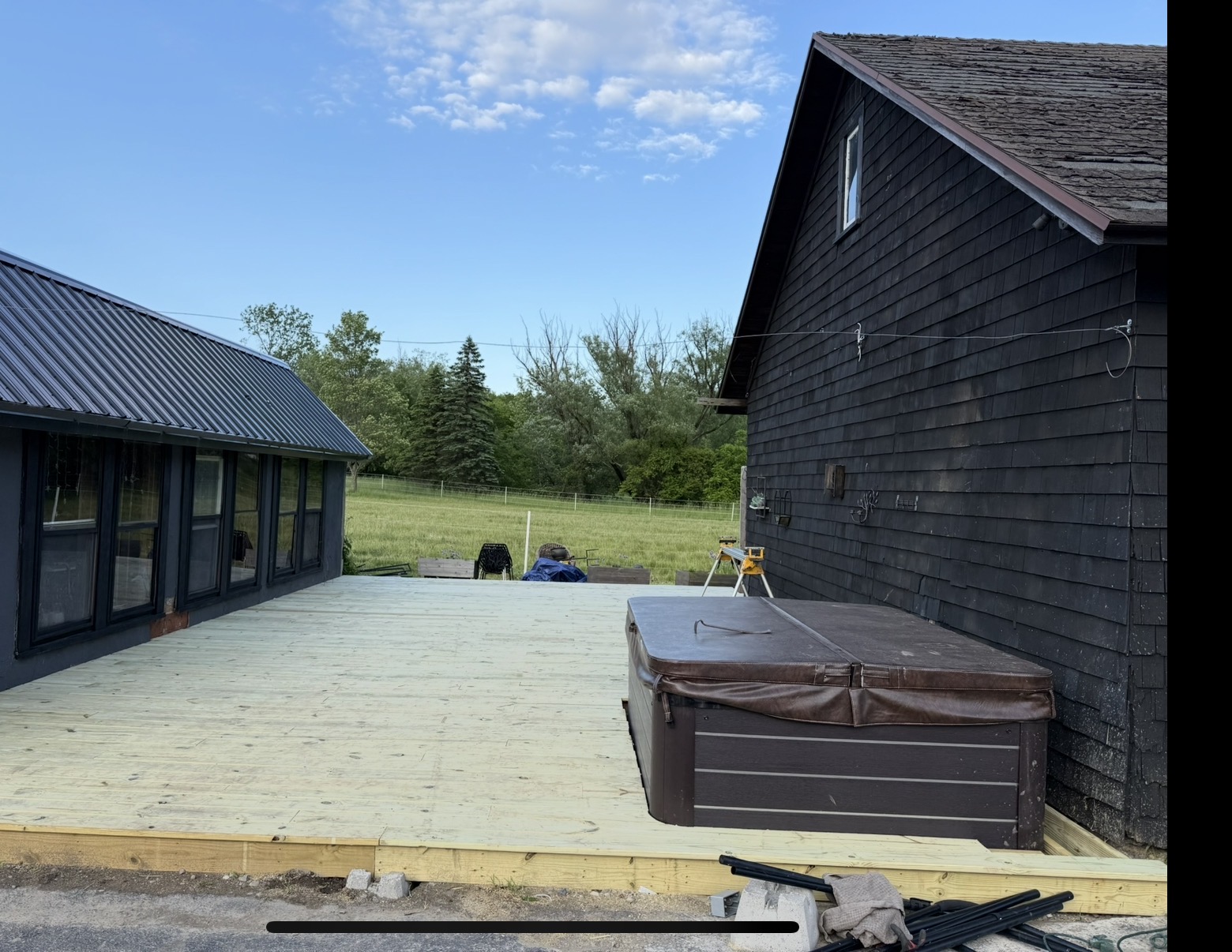 Outdoor construction area between two dark-sided buildings