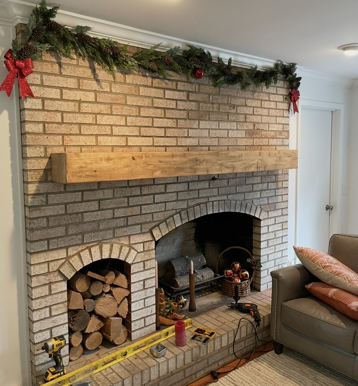 Brick fireplace with a wood storage opening